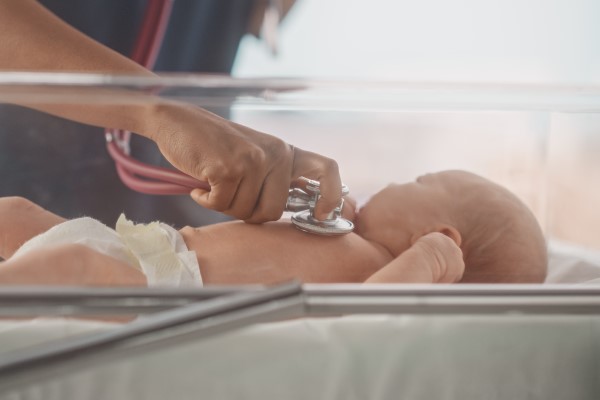 Baby monitored with stethoscope
