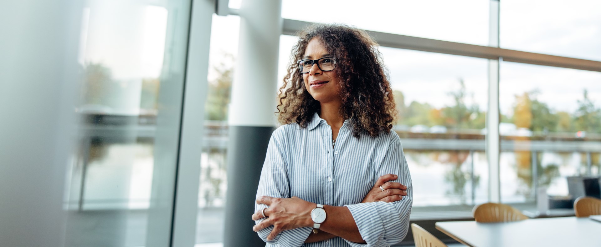 Woman with arms crossed.